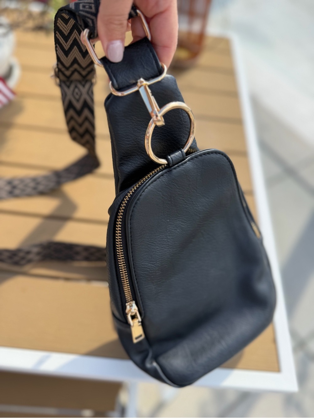 Moda Luxe Black Crossbody Sling with Gold Hardware and Patterned Strap